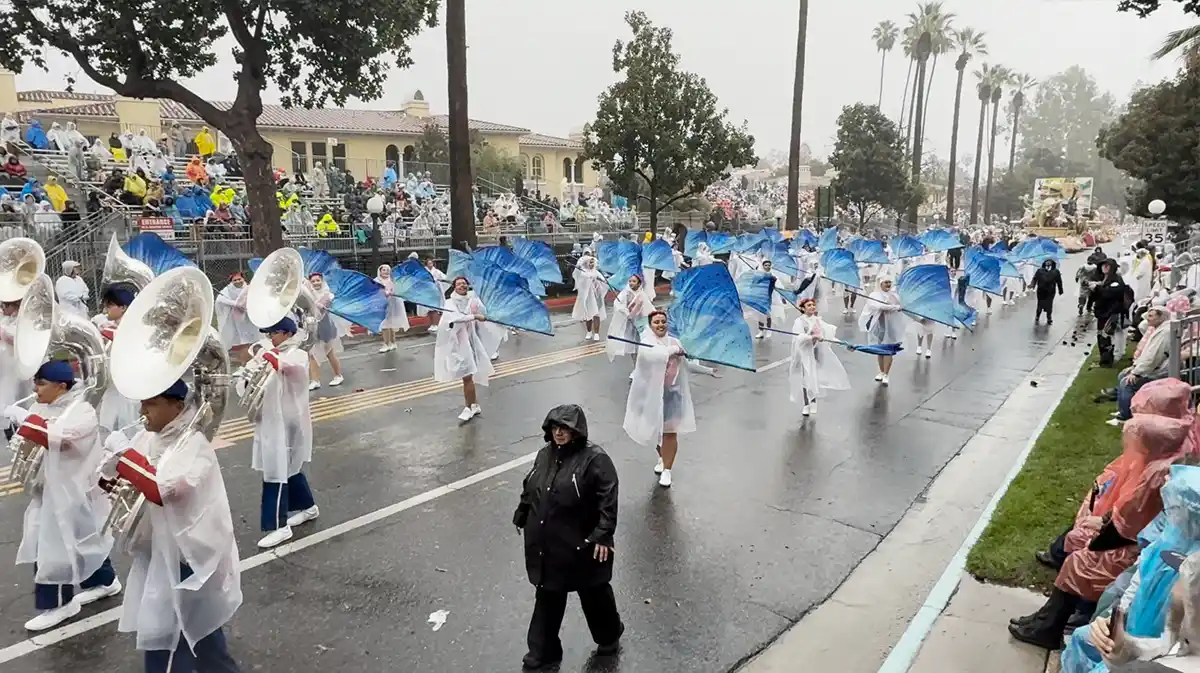 Rose Parade 2026 floats moving through torrential rain in Pasadena
