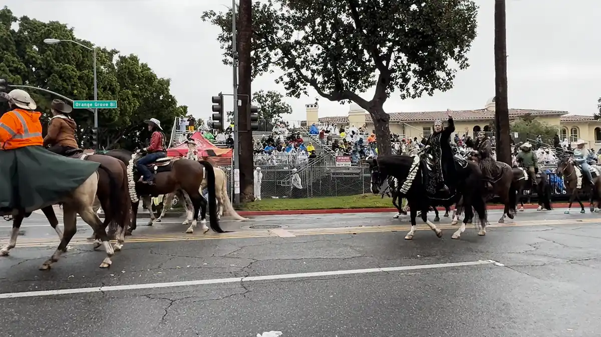 Rose Parade 2026 floats moving through torrential rain in Pasadena