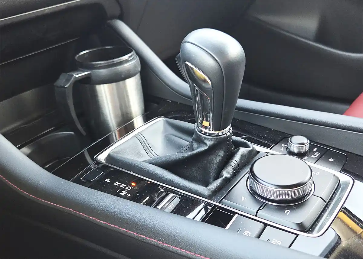 Mazda3 sedan review highlighting premium design, driving joy, and near-luxury interior value