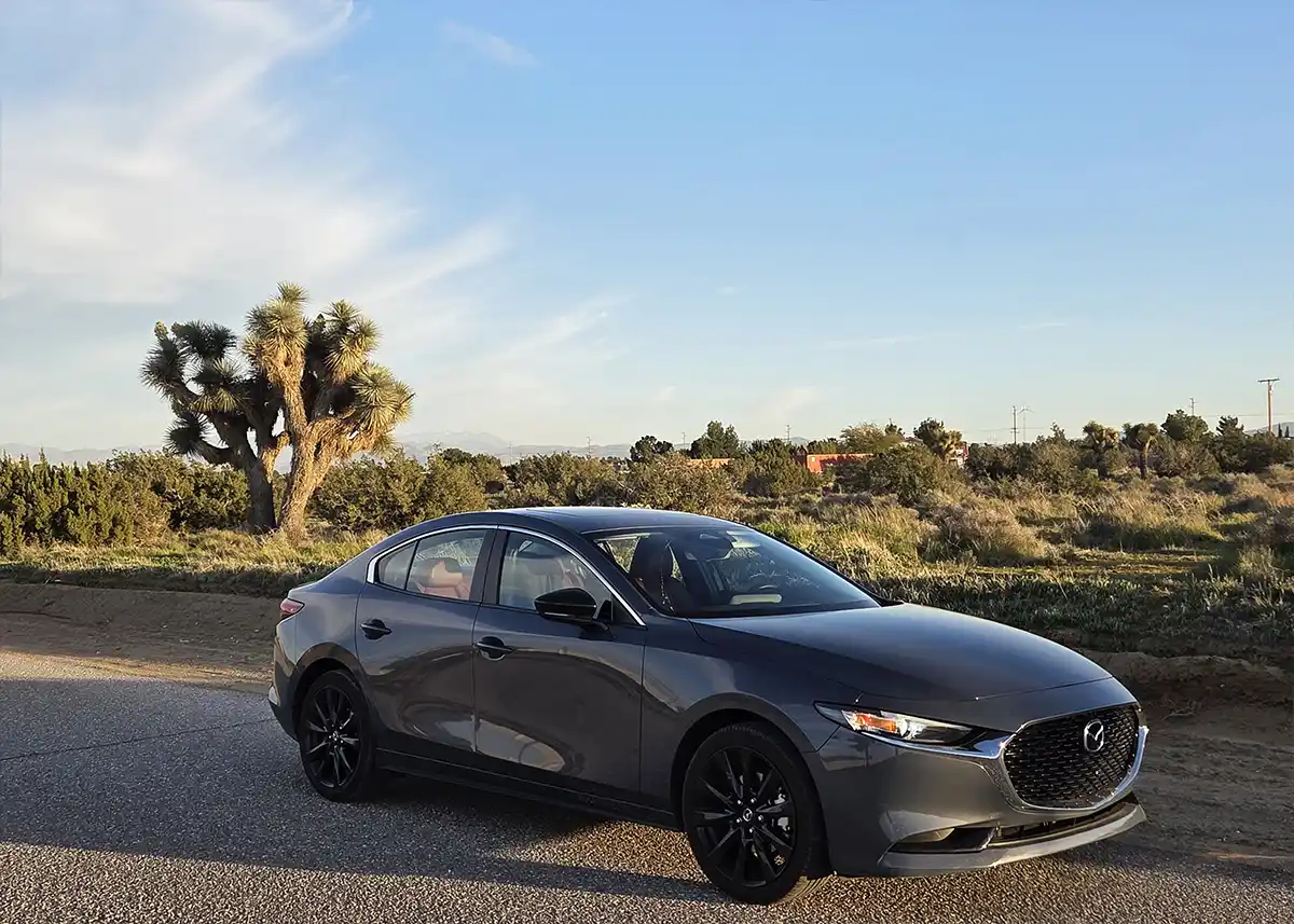 Mazda3 sedan review highlighting premium design, driving joy, and near-luxury interior value