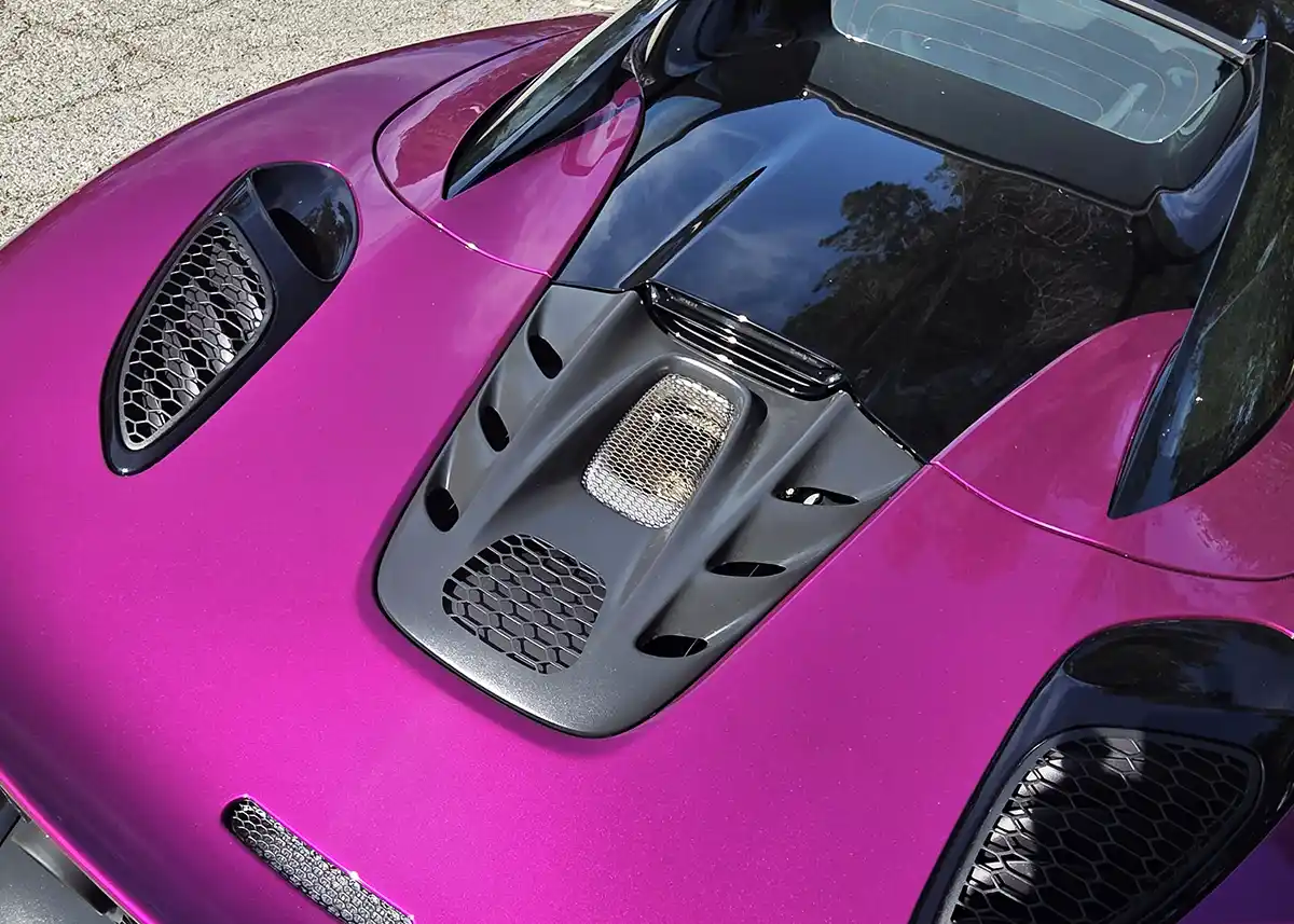 2026 McLaren Artura Spider in motion on a road