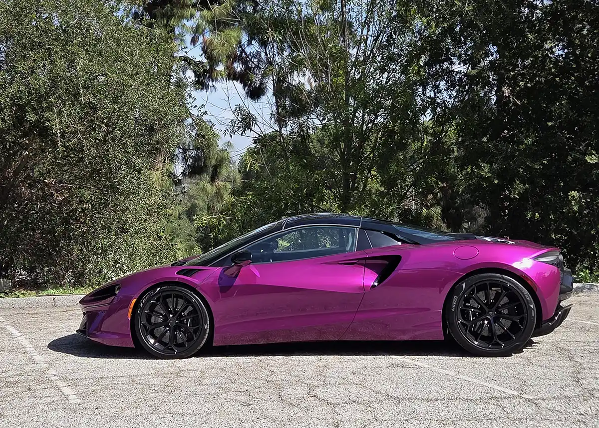 2026 McLaren Artura Spider in motion on a road