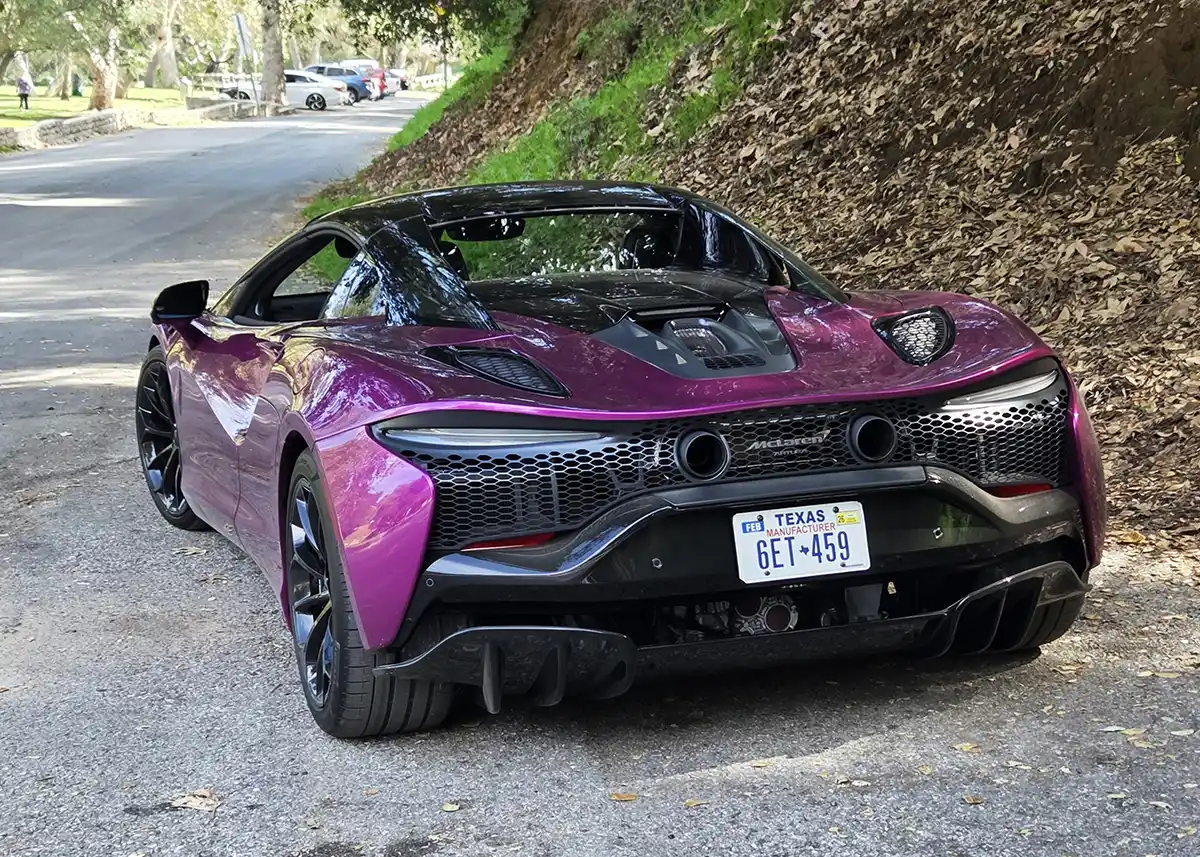 2026 McLaren Artura Spider in motion on a road