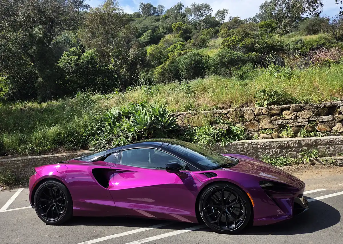2026 McLaren Artura Spider in motion on a road