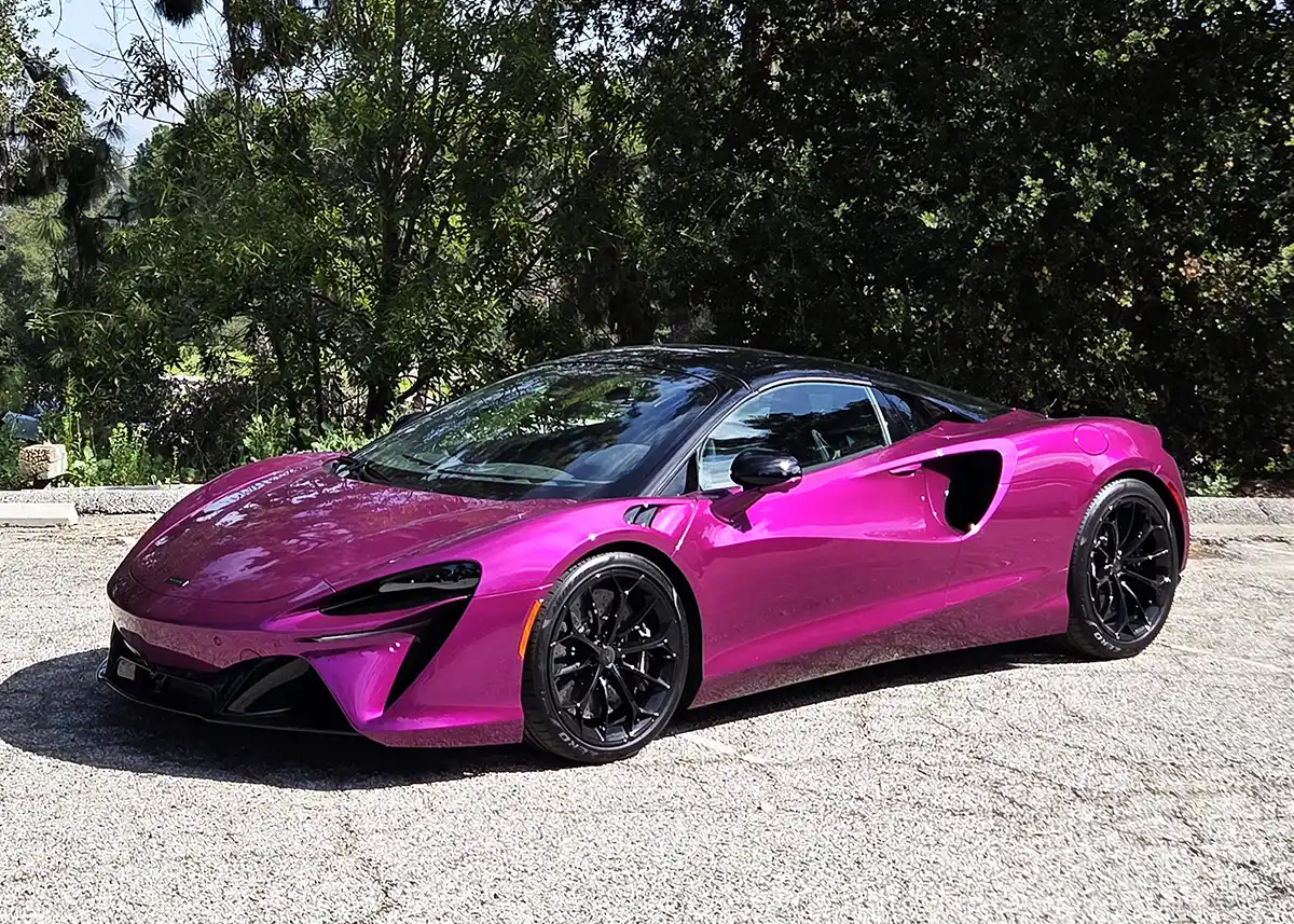 2026 McLaren Artura Spider in motion on a road