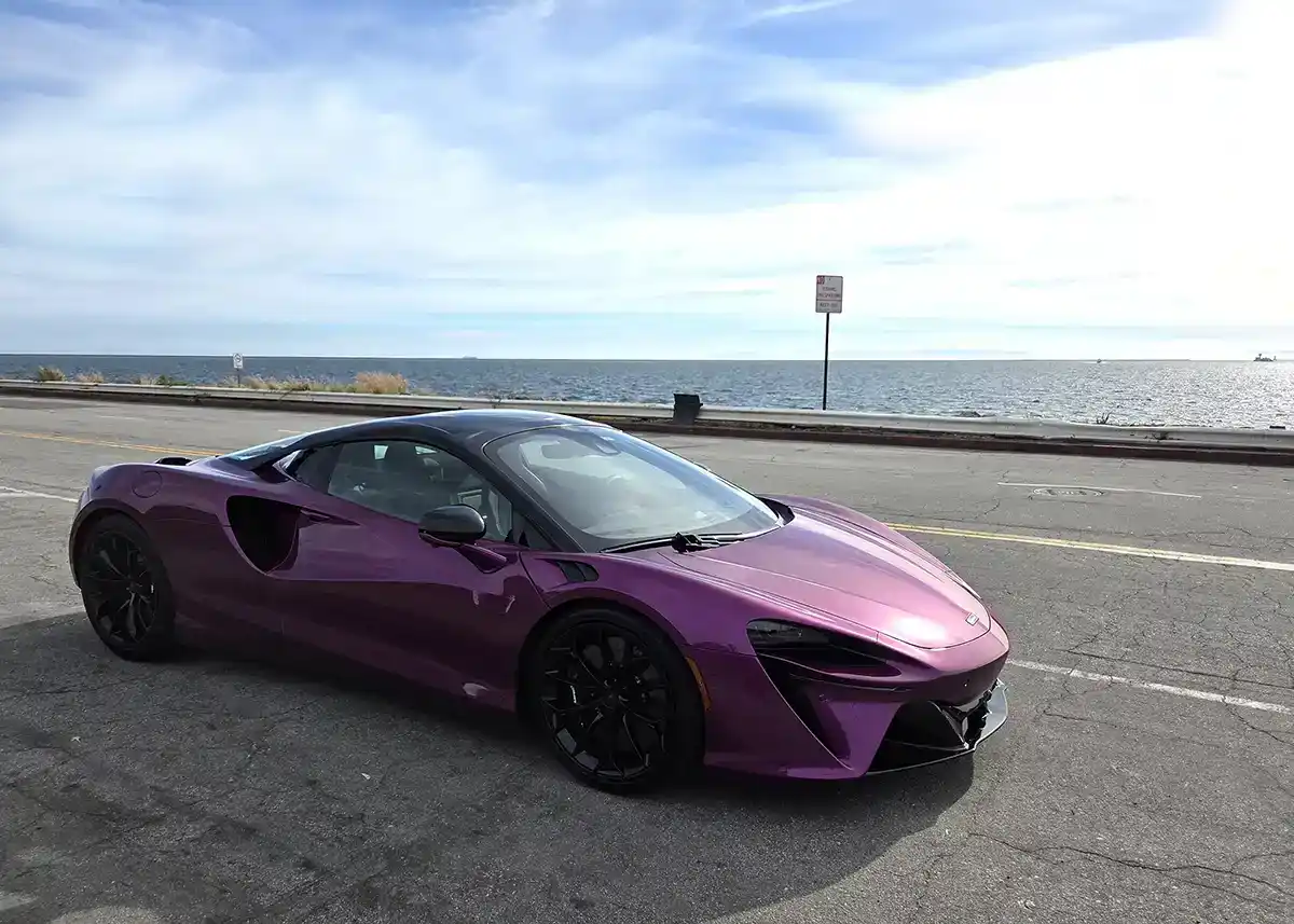 2026 McLaren Artura Spider in motion on a road