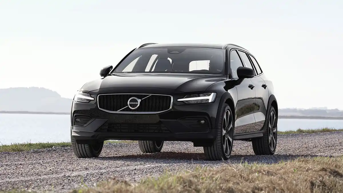 2026 Volvo V60 Cross Country parked outdoors in a modern Scandinavian-style setting
