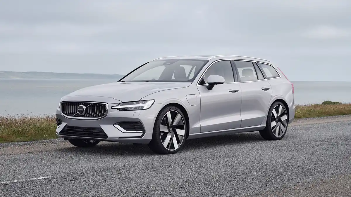 2026 Volvo V60 Cross Country parked outdoors in a modern Scandinavian-style setting